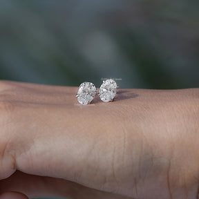 In Hand View Of an oval lab diamond Earring
