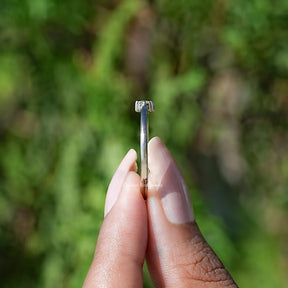 Side View of Round Cut Lab Diamond Toi Et Moi Ring In two fingers