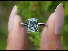video view of Fancy Green Elongated cushion moissanite hidden halo ring
