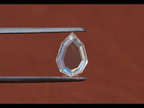 YouTube Video Of Step Cut Portrait Pear Cut Loose Moissanite