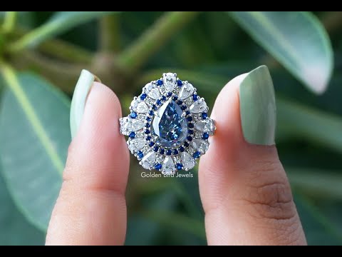YouTube Video Of Blue Pear Shaped Moissanite Engagement Ring