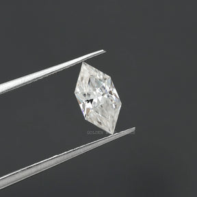 tweezer holding the Colorless Dutch Marquise Cut Loose Moissanite