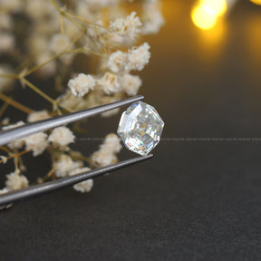 In Tweezer View Of Moissanite Step Cut Cushion Cut Loose
