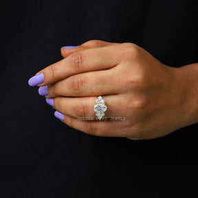 In finger front view of an oval moissanite  engagement  ring
