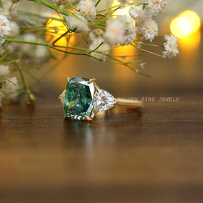Close view of A moissanite engagement  ring featuring a cushion shape stone 