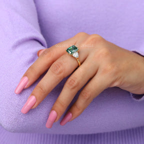 Moissanite  ring in colorless side stones 