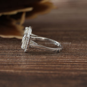 Marquies and pear cut moissanite  engagement ring in a secure setting 