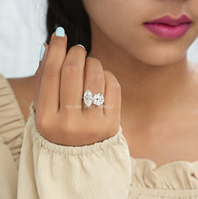 View of Marquise And Round Cut Moissanite Ring In Finger
