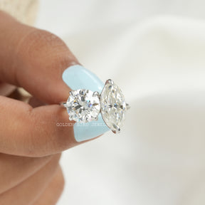 In finger front View of Marquise And Round Moissanite Ring In White Gold