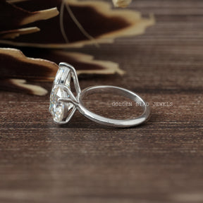 View of Round And Marquise Moissanite Toi Moi Ring In Finger