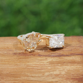 View of pear and radiant cut moissanite  ring in prongs setting 