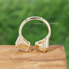 Back view of two shaped moissanite engagement ring in unique design 