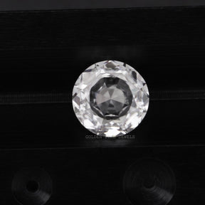Detailed View Of Colorless Rose Cut Round Loose