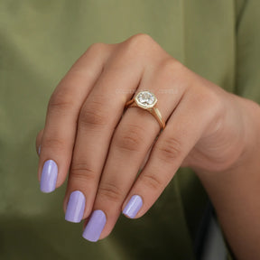 Detailed View of Bezel Set Octagon Cut Solitaire Ring In Yellow Gold