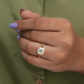 View of Bezel Set Colorless Octagon Cut Solitaire Ring In Finger