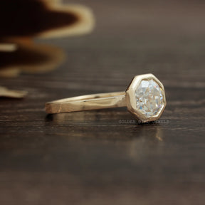 View of Octagon Cut Moissanite Solitaire Ring In Yellow Gold
