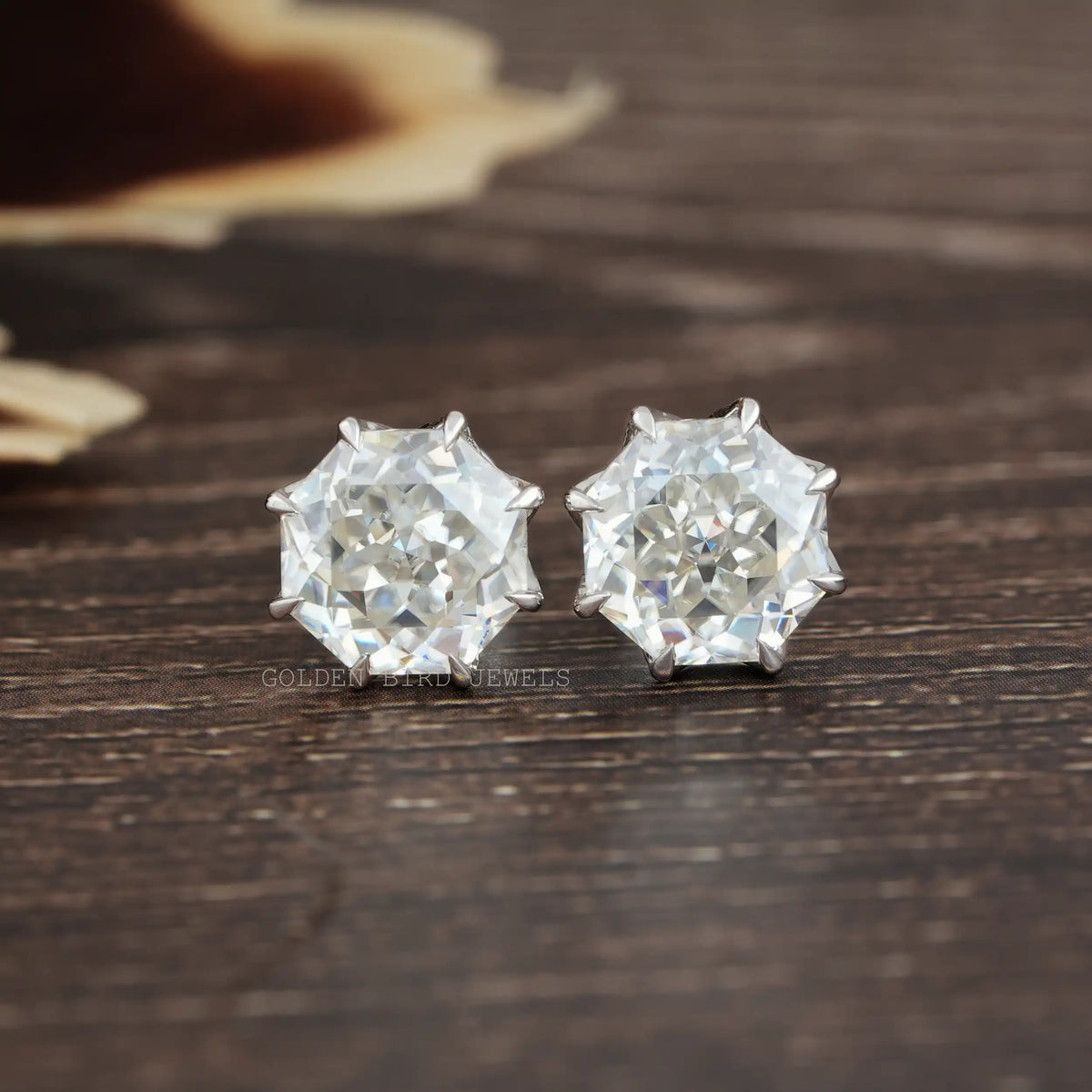 Front view of octagon shaped moissanite stud earrings