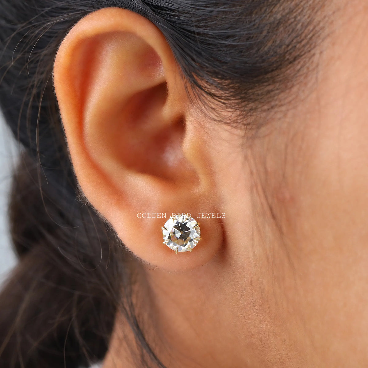 In ear view of european cut cluster moissanite earrings
