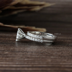 View of Moissanite Round Cut Wedding Band In Finger