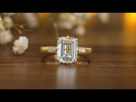 Youtube video of modified emerald cut  sollitaire moissanite  engagement ring 
