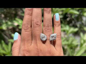 Youtube video of  step cut pear & marquies moissanite engagement ring 